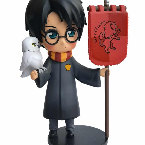 *Figura plastoy harry potter harry potter con hedwig y estandarte gryffindor