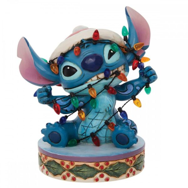 *Figura enesco disney stitch envuelto en luces de navidad